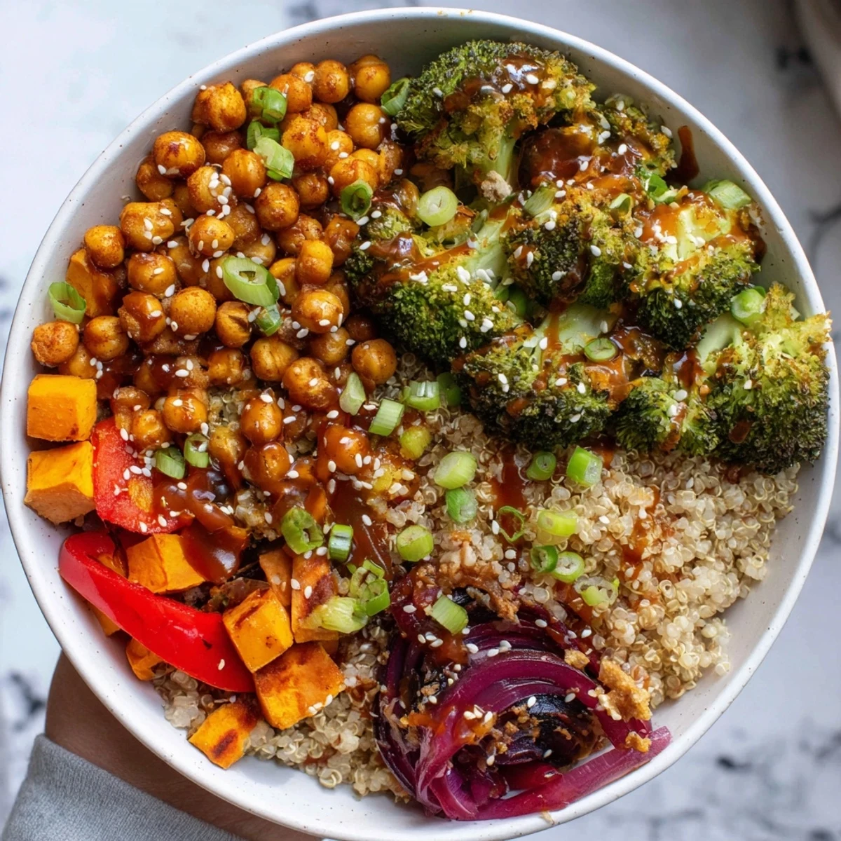 Colorful grain bowls featuring miso-butter and gochujang-maple sauces for delightful flavor.  