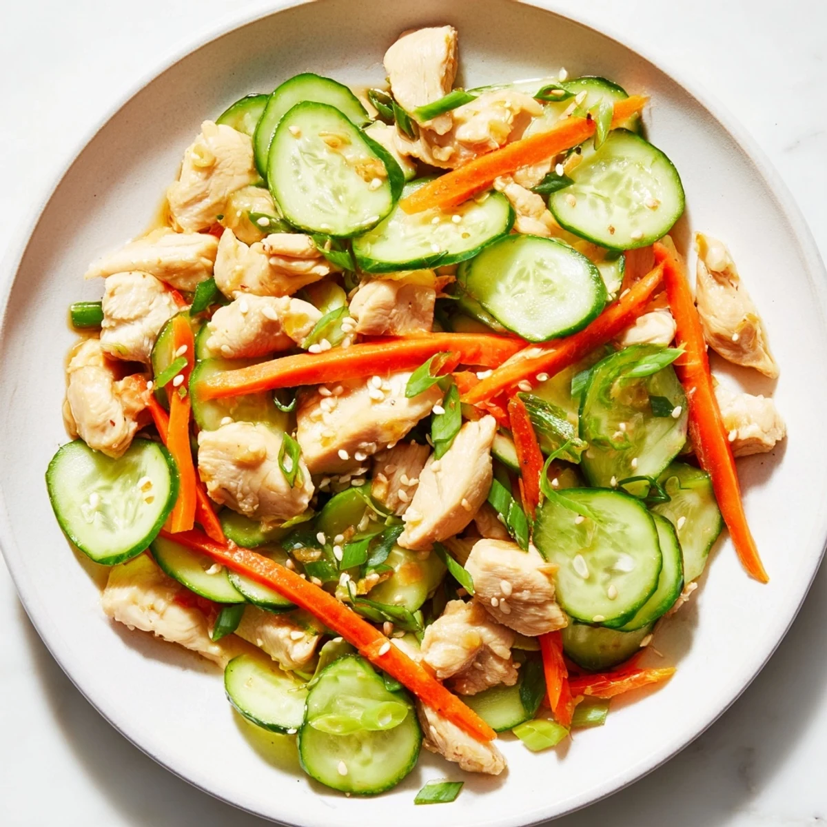 This satisfying deli container shaker chicken salad features tender chicken, colorful veggies, and a zesty, homemade dressing.