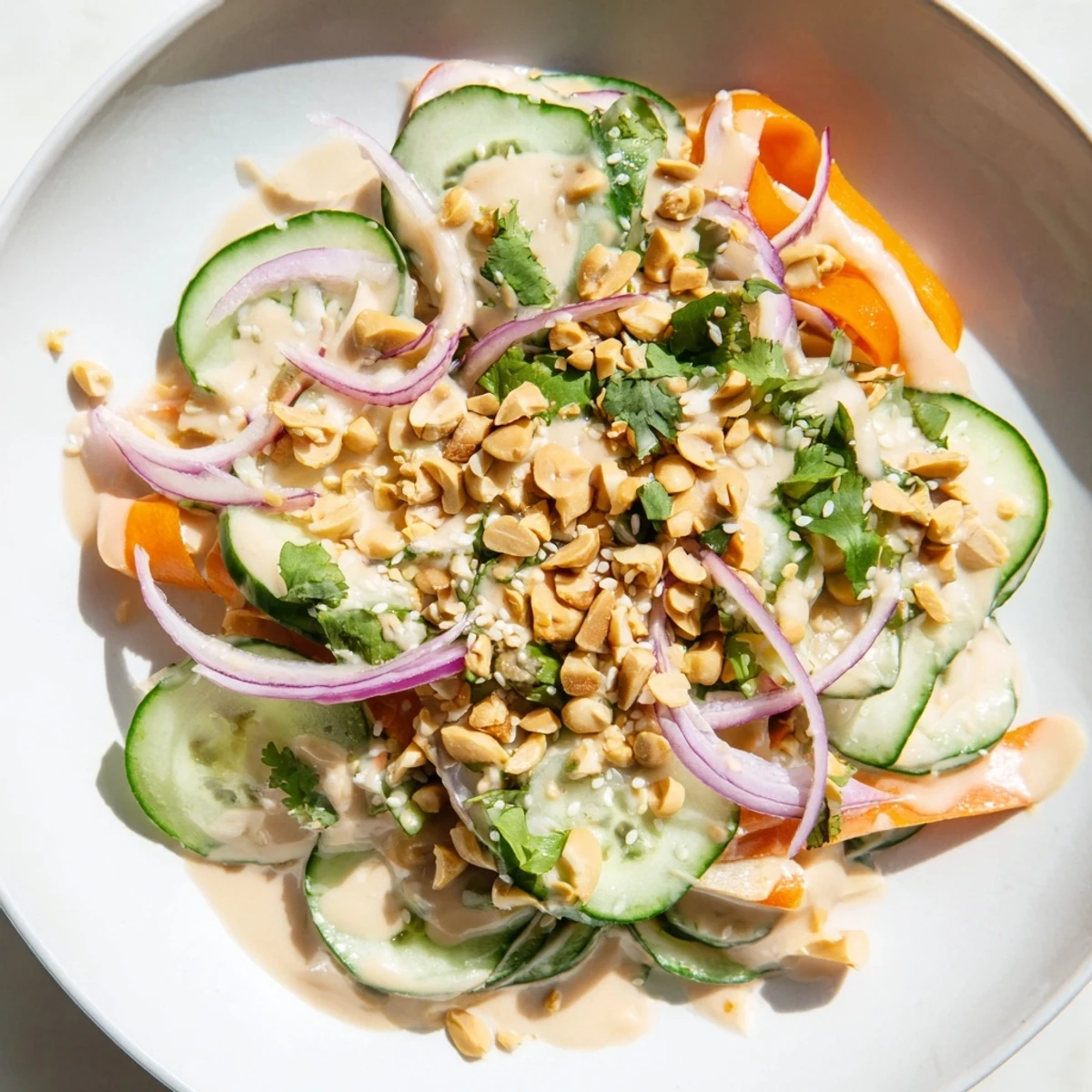 Enjoy the bright flavors of this cool and easy Thai-Style Peanut Cucumber Salad served today.