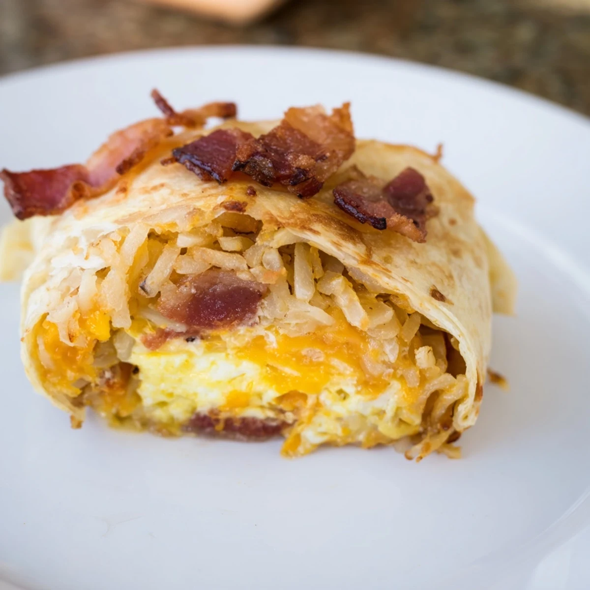 Golden brown B.E.C. breakfast bites, showcasing crispy bacon and melted cheese filling the tortilla.