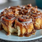 Juicy peaches baked with cinnamon roll pieces, a delightful brunch treat.