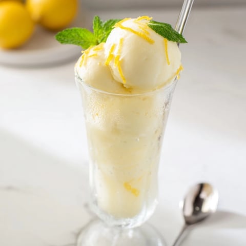 Creamy vanilla ice cream swirled with vibrant limoncello creates a refreshing Limoncello Float.