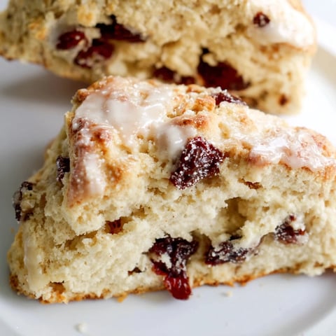 Delicious Sparkling Cherry Soda Scones topped with coarse sugar and dried cherries.  