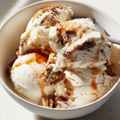 Creamy Cottage Cheese Ice Cream with Cookie Dough, drizzled in maple syrup.  