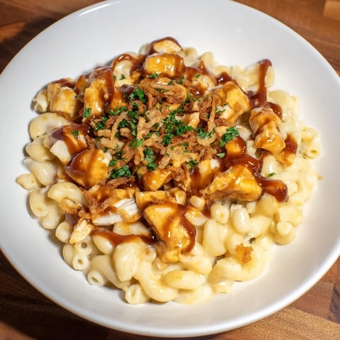 One-Pot Honey BBQ Chicken Mac and Cheese, creamy with a golden cheese crust, ready to serve as a family meal.