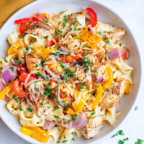 Golden-topped Cajun Chicken Pasta Bake: imagine bubbly cheese over tender chicken and pasta flavors.