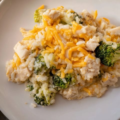 Golden-brown Chicken & Broccoli Rice Casserole bubbling with cheesy goodness, ready to be served.