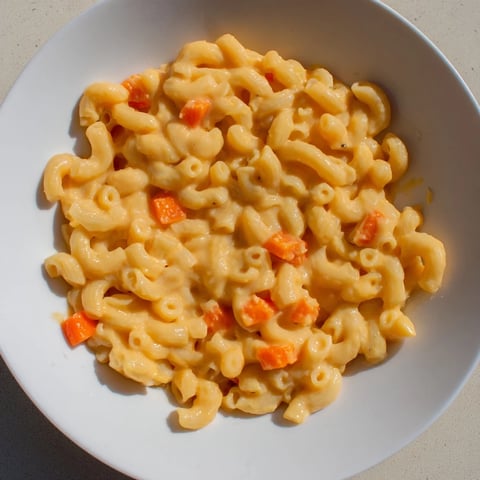 Creamy one-pot butternut squash mac & cheese, a comforting hug in a bowl, perfect for dinner.