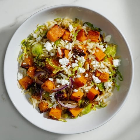 Best Fall Harvest Orzo Salad featuring vibrant roasted vegetables and creamy goat cheese, ready to serve.