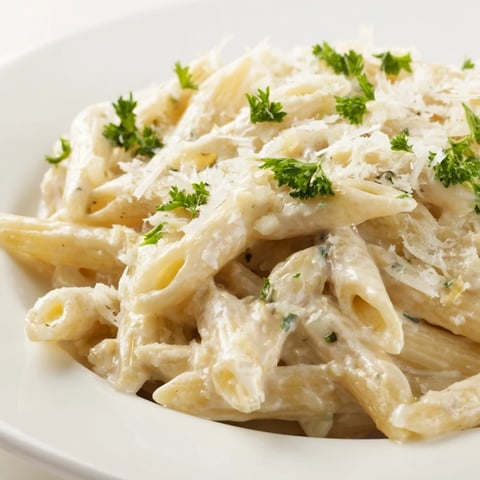 Perfectly creamy, one-pot Creamy Milk Pasta ready to enjoy, with Parmesan topping.
