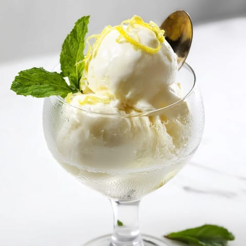 Homemade Limoncello Float: Watch chilled prosecco fizz over lemon zest and scoops of ice cream.