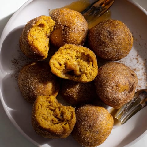 Deliciously spiced pumpkin pancake balls, oozing with caramel and fragrant chai spices.  