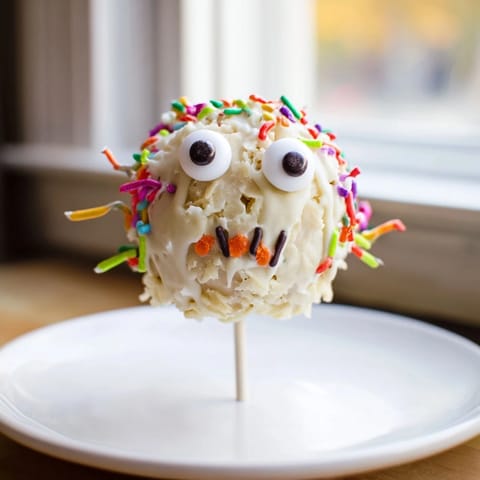 Whimsical Cheesy Jalapeño Sweet Tea Monster Cake Pops with colorful candy eyes and decorations.  