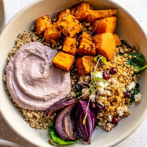 Nutrient-rich Spiced Winter Bowls featuring colorful roasted vegetables and creamy ube-coconut.  