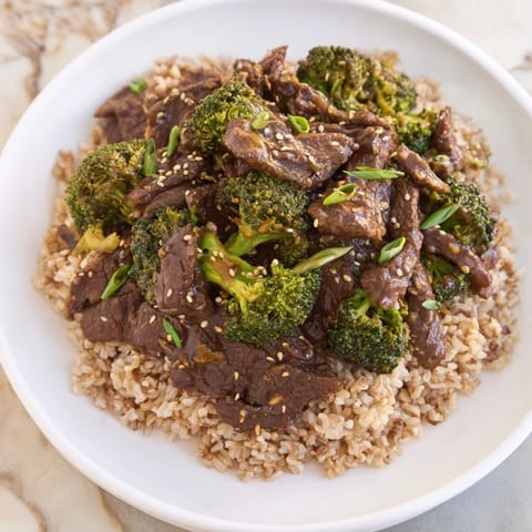 This image shows a close-up of the delicious Slow-Cooker Beef & Broccoli, a flavorful Asian-inspired meal.
