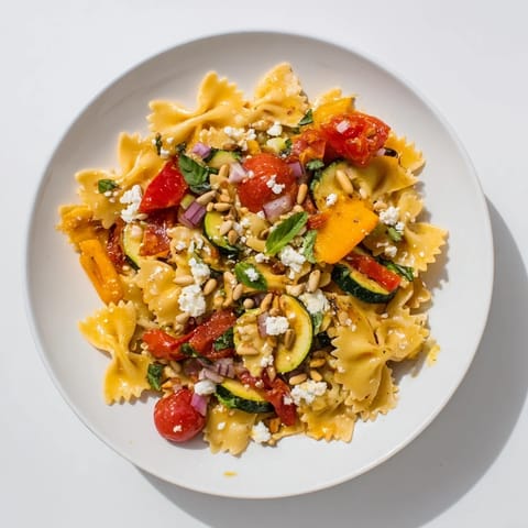 Festive Bow Tie Pasta Platter, a vegetarian delight, ready to be served and enjoyed at a gathering.