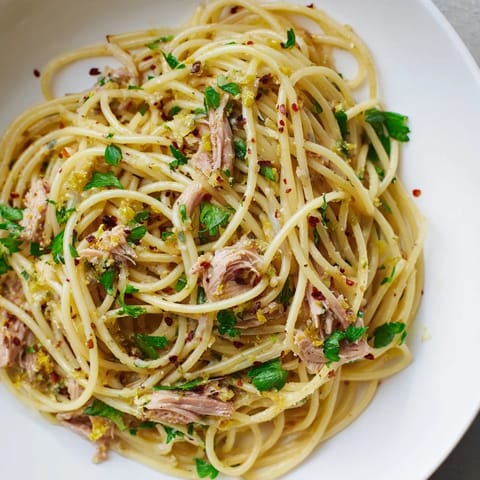 This close-up showcases the flavorful Lemon-Garlic Tuna Spaghetti, a quick weeknight pasta meal.
