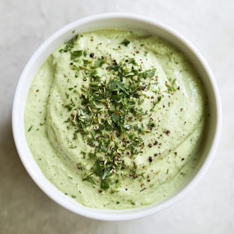 Homemade Green Goddess Dip, a bright, smooth appetizer perfect for summer entertaining with friends.